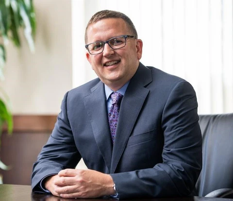 Dr. Michael E. Busing
